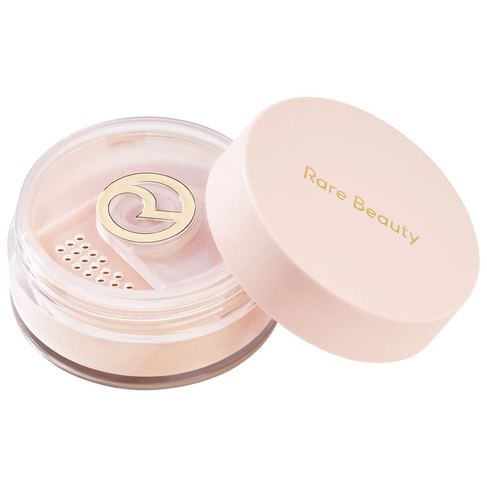 Polvo fijador Always an Optimist Soft Radiance Setting Powder Rare Beauty