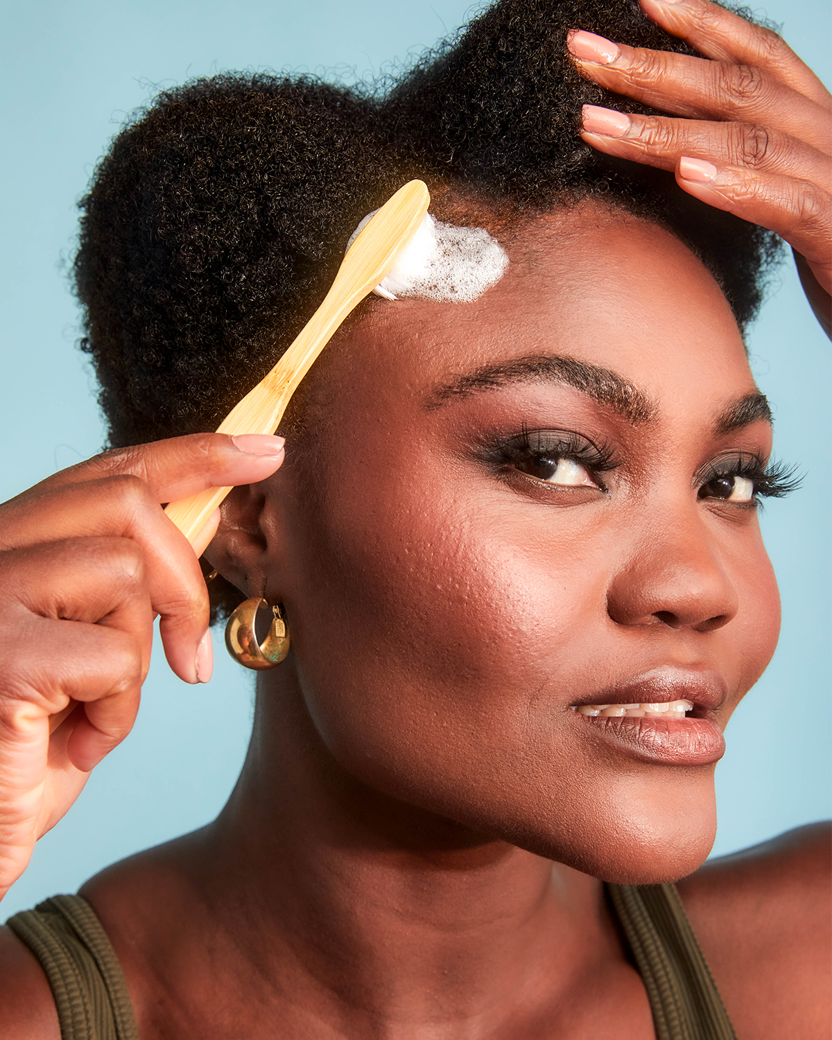 Aplicación de Dream Curl Mousse Sienna Naturals